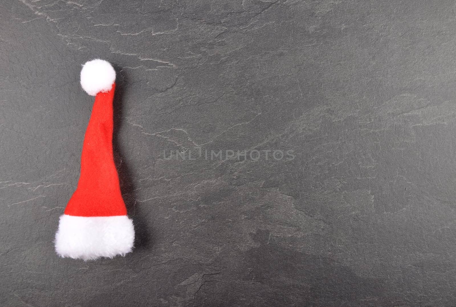 Santa hat on slate background