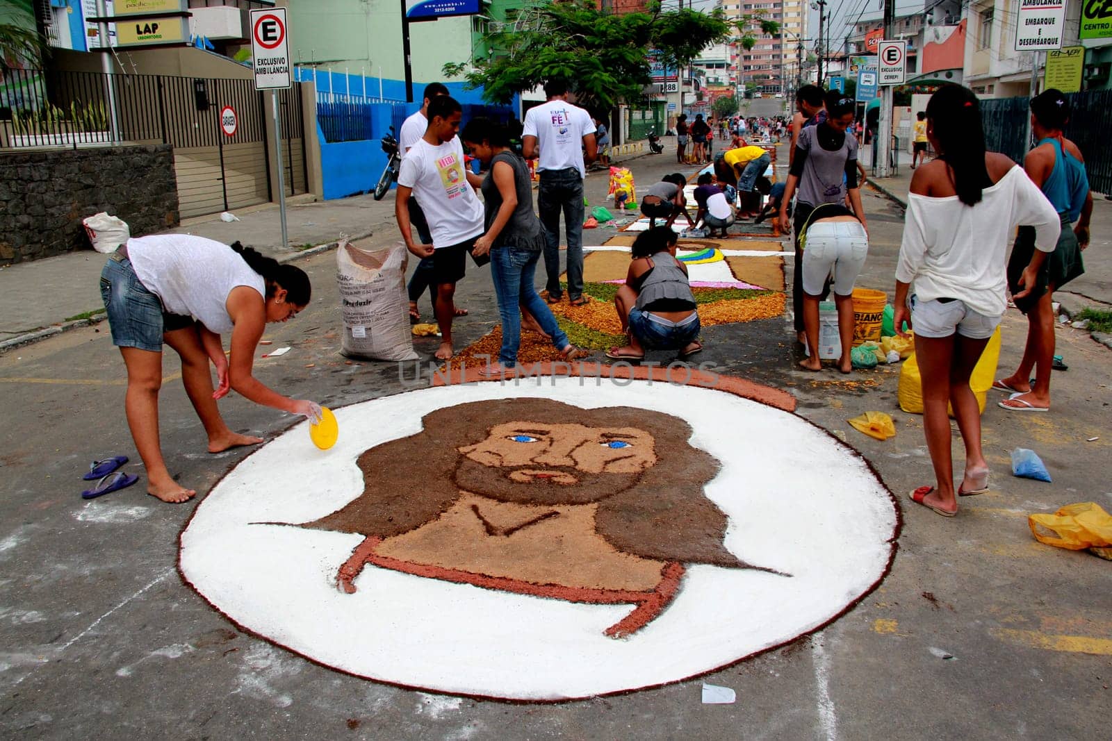 Itabuna, Bahia / Brazil - June 7, 2012: People are seen making traditional tapes during the Corpus Crist holiday festivities in Itabuna.