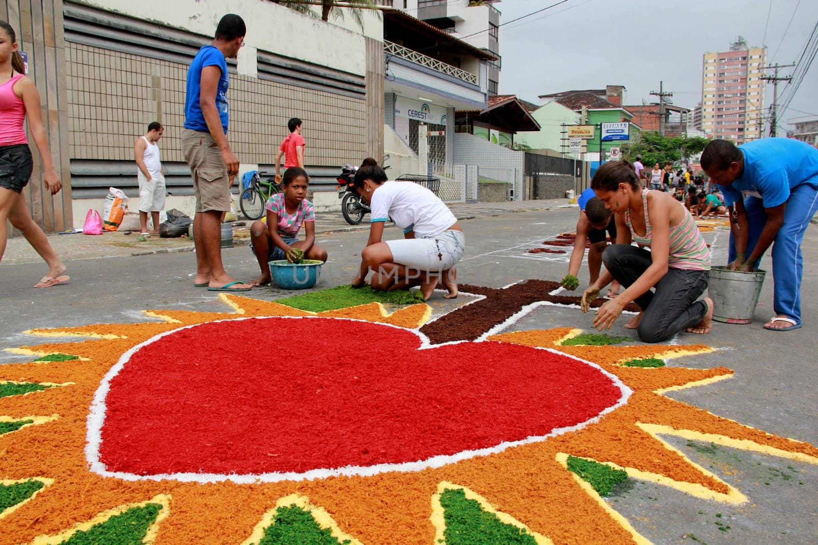 Itabuna, Bahia / Brazil - June 7, 2012: People are seen making traditional tapes during the Corpus Crist holiday festivities in Itabuna.