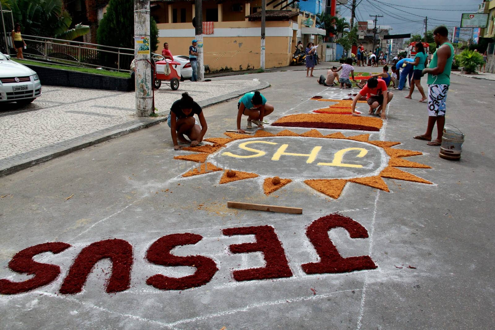 Itabuna, Bahia / Brazil - June 7, 2012: People are seen making traditional tapes during the Corpus Crist holiday festivities in Itabuna.
