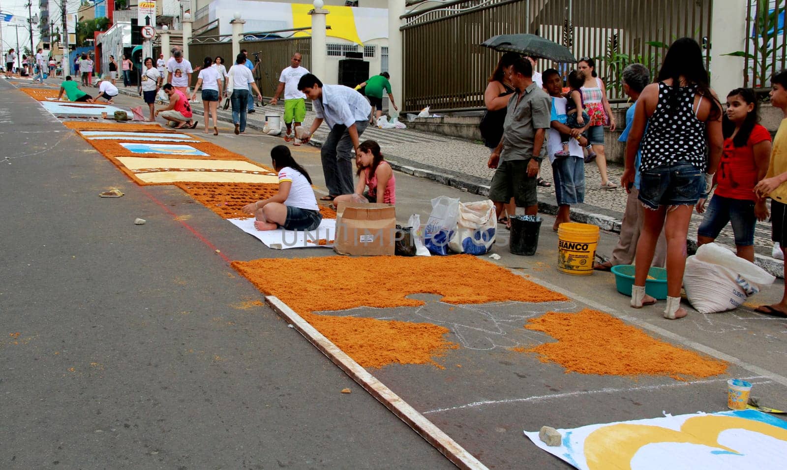 Itabuna, Bahia / Brazil - June 7, 2012: People are seen making traditional tapes during the Corpus Crist holiday festivities in Itabuna.