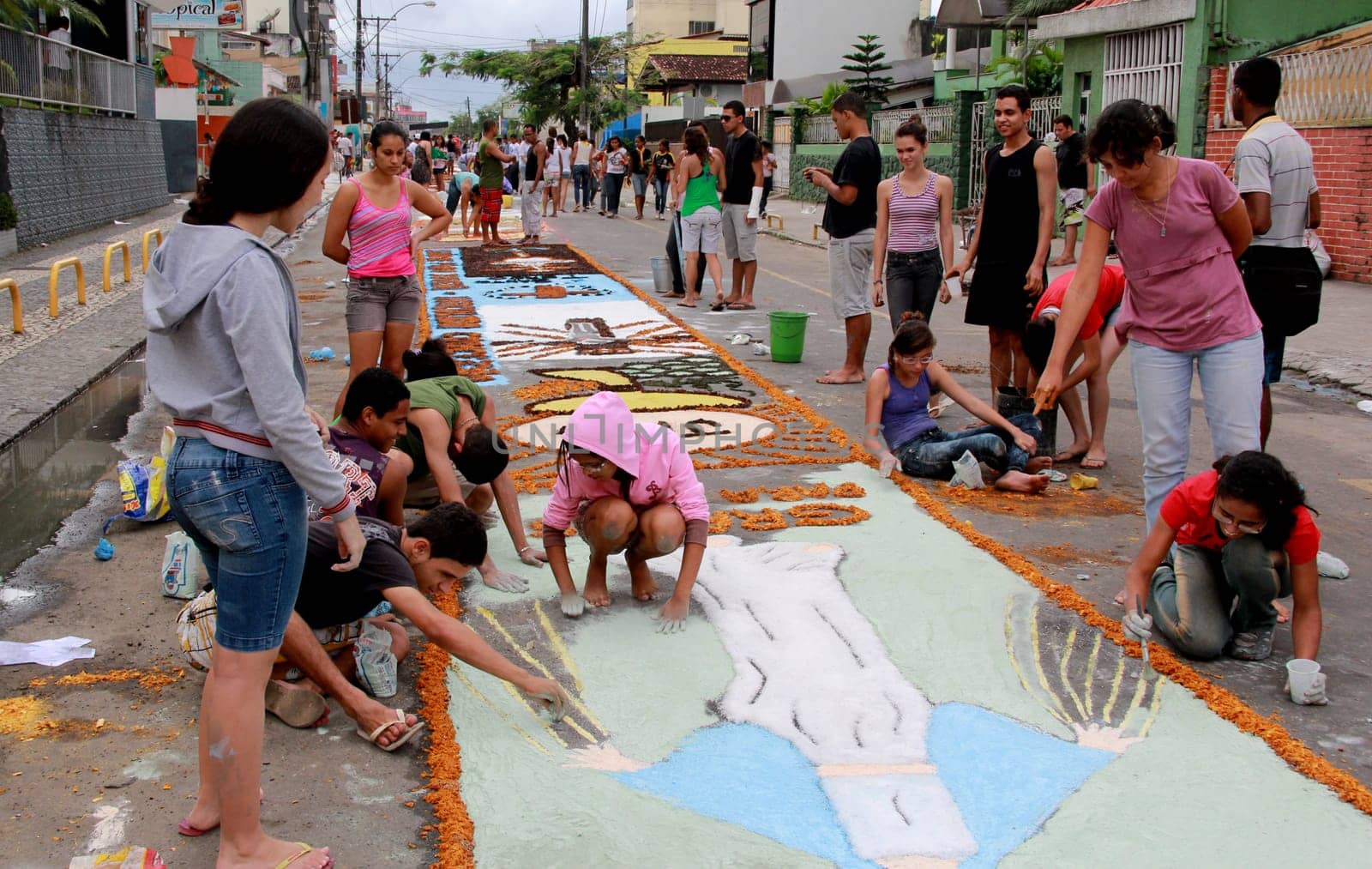 Itabuna, Bahia / Brazil - June 7, 2012: People are seen making traditional tapes during the Corpus Crist holiday festivities in Itabuna.