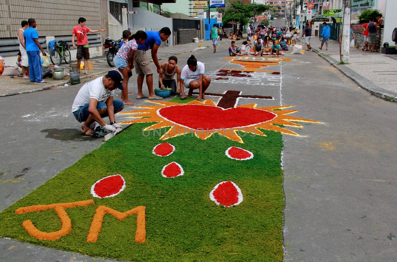 Itabuna, Bahia / Brazil - June 7, 2012: People are seen making traditional tapes during the Corpus Crist holiday festivities in Itabuna.