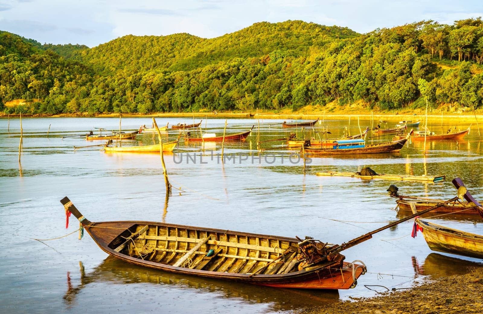 Thai long tail fishing boats at fishing village on Ko Yao Yai island in the Andaman Sea in Thailand