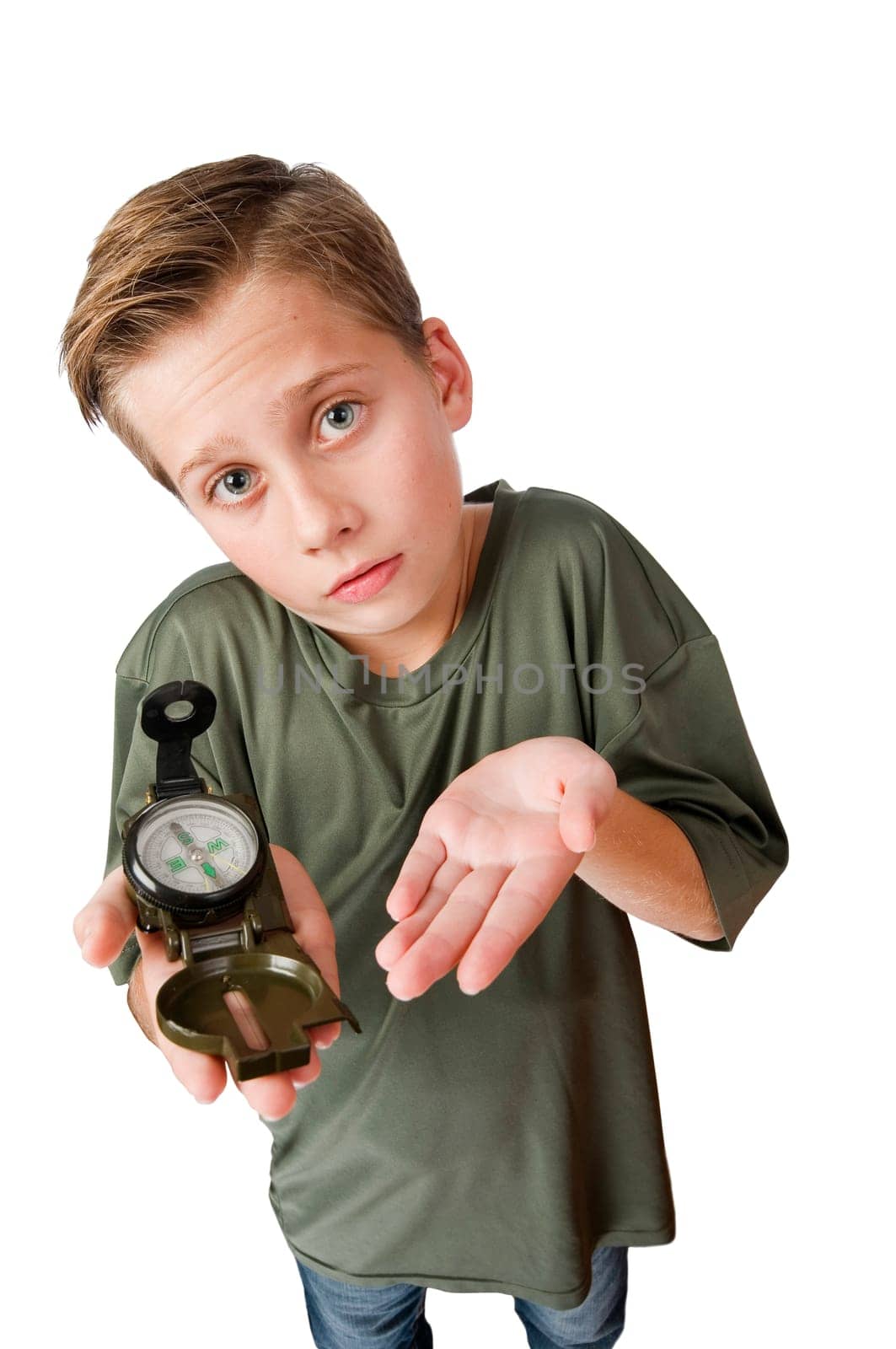 Wide-angle three-quarter view of a 12-year-old Caucasian boy with a compass on his right hand looking at the camera at a loss, isolated on white.