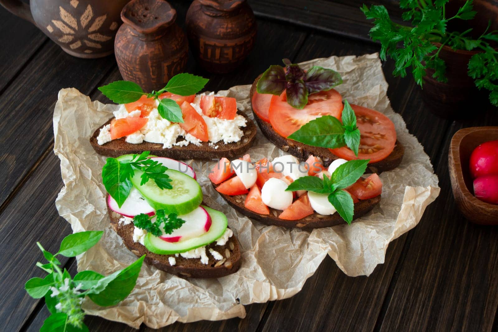 Assorted bruschetta with various toppings. Appetizing bruschetta or sandwiches. Mix