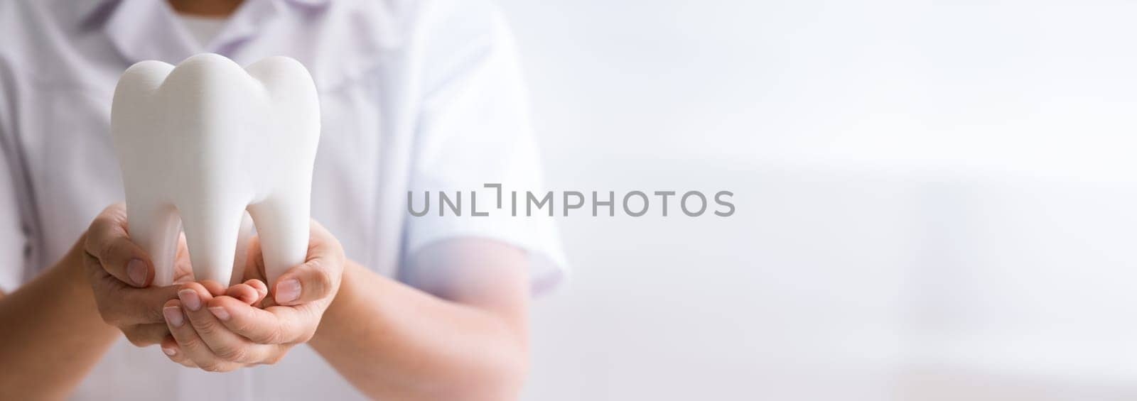 Dentist Woman Doing Cleaning And Whitening Tooth Treatment