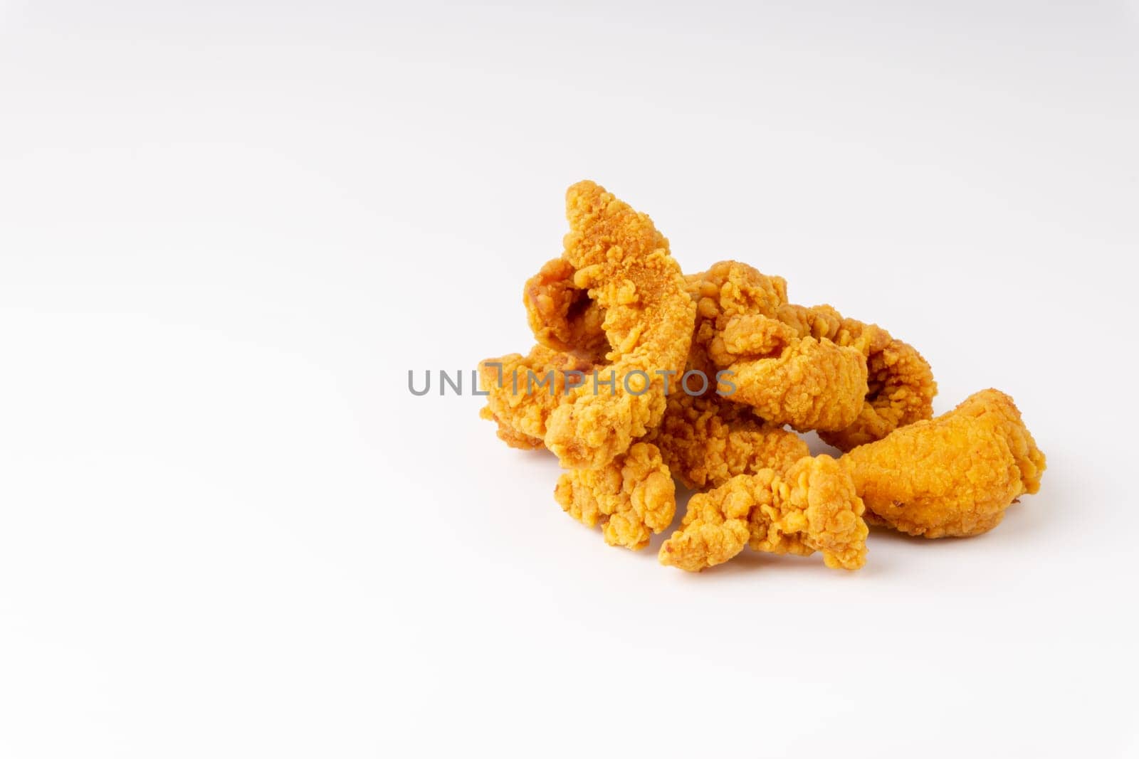 Fried breaded chicken fillet isolated on white background