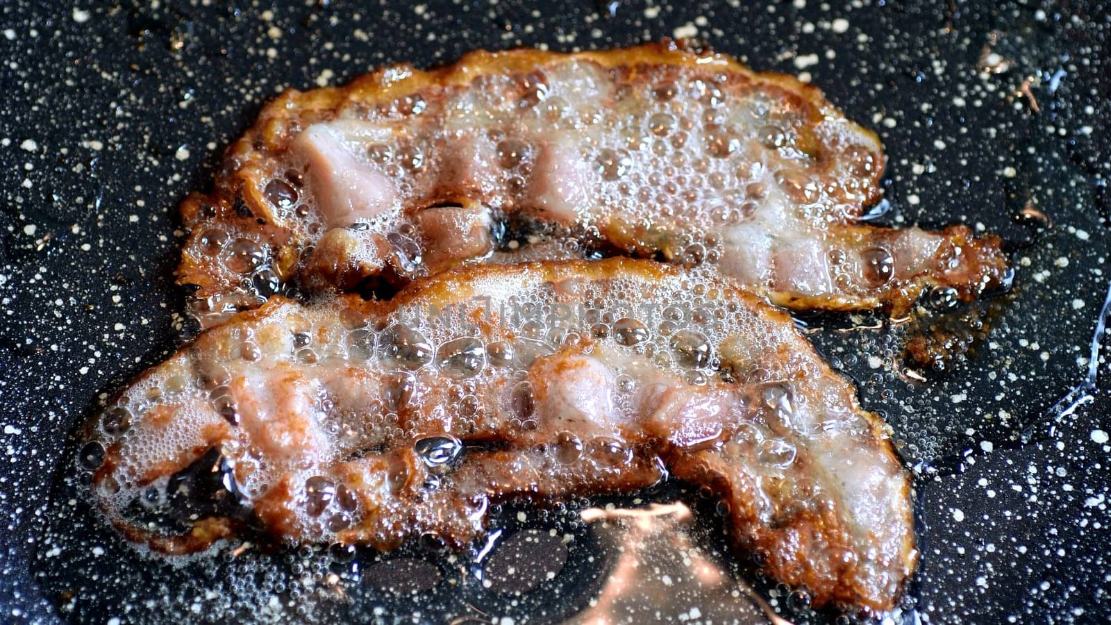 Close-up of a Bacon Fried On Grill