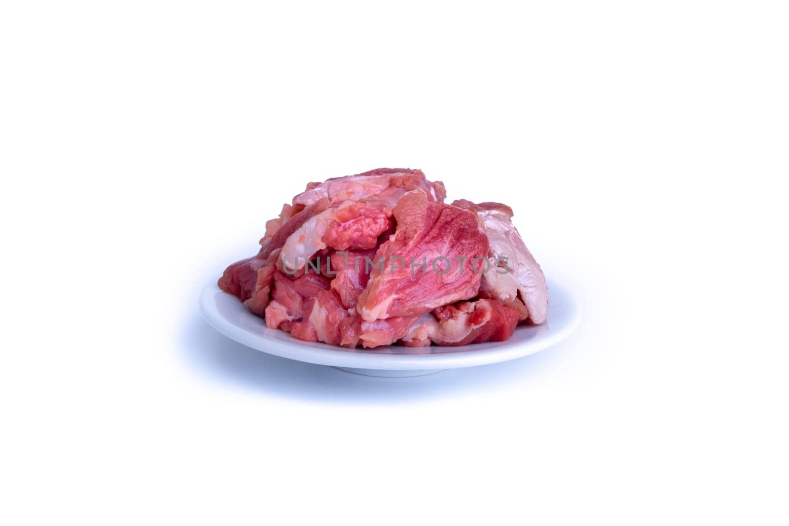Fresh raw beef steak isolated on white background with selective focus
