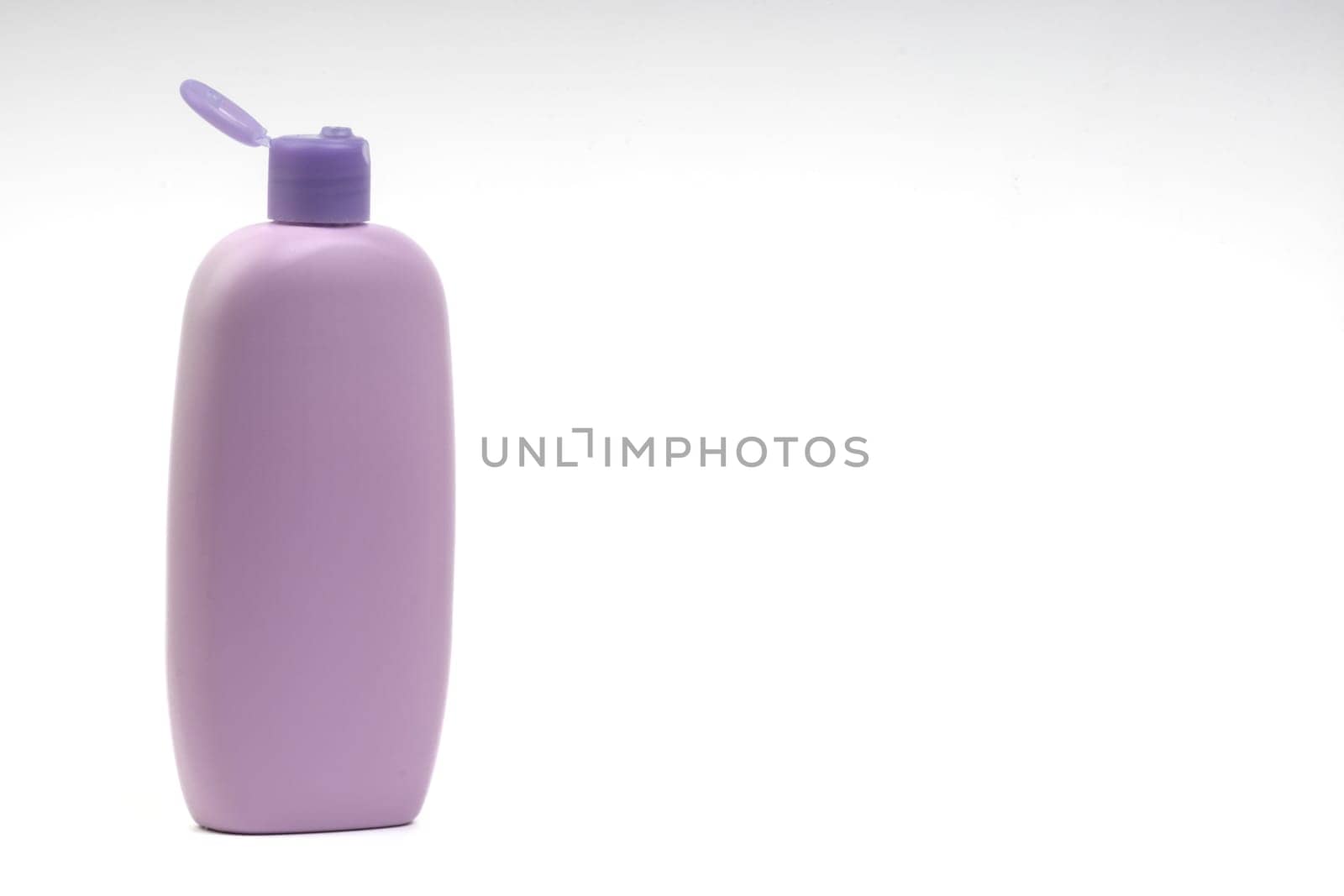 Baby lotion or shampoo bottle isolated on white background. Healthcare and business concept