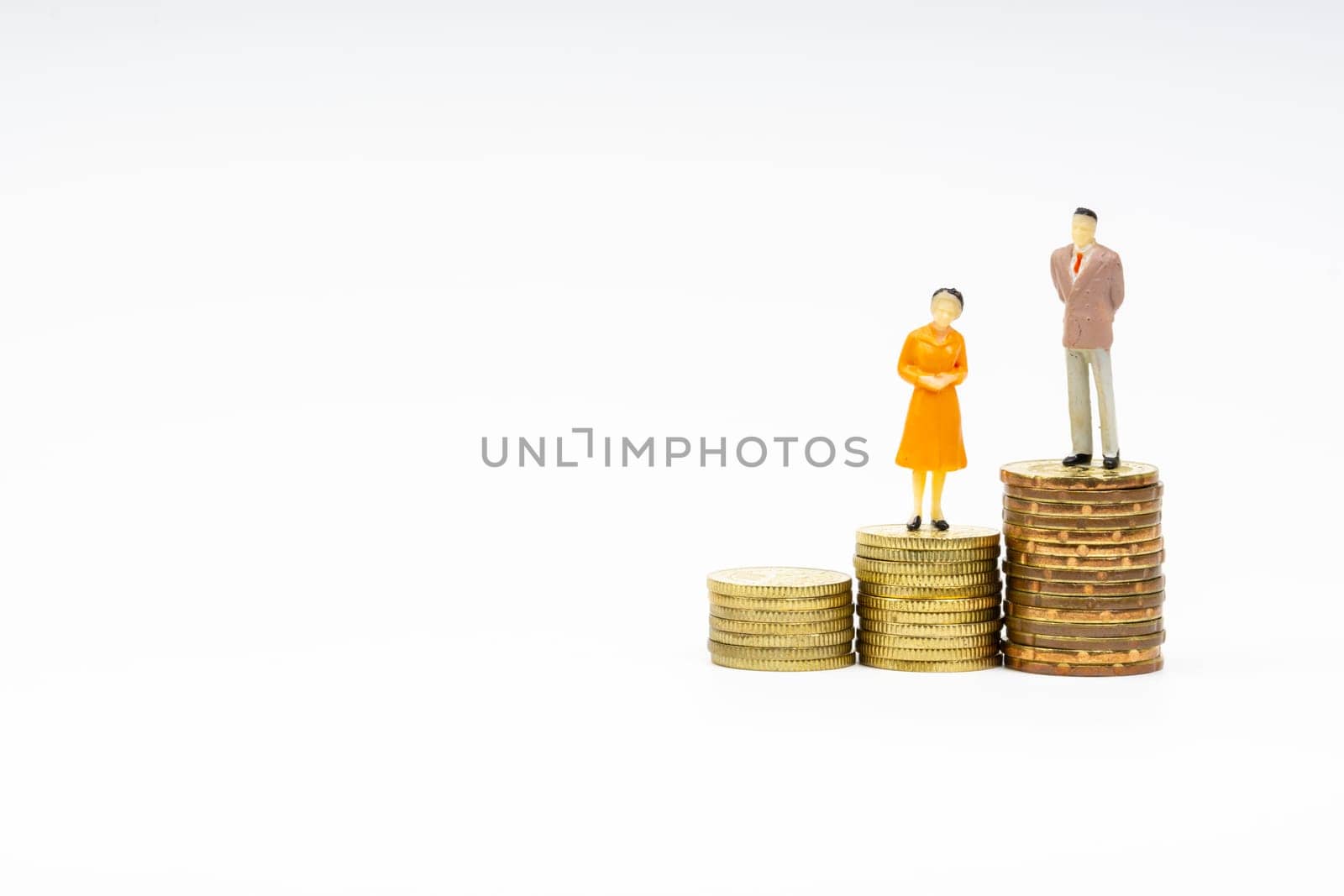Miniature people standing on stacking coins with white background. Business and Lifestyle concepts.