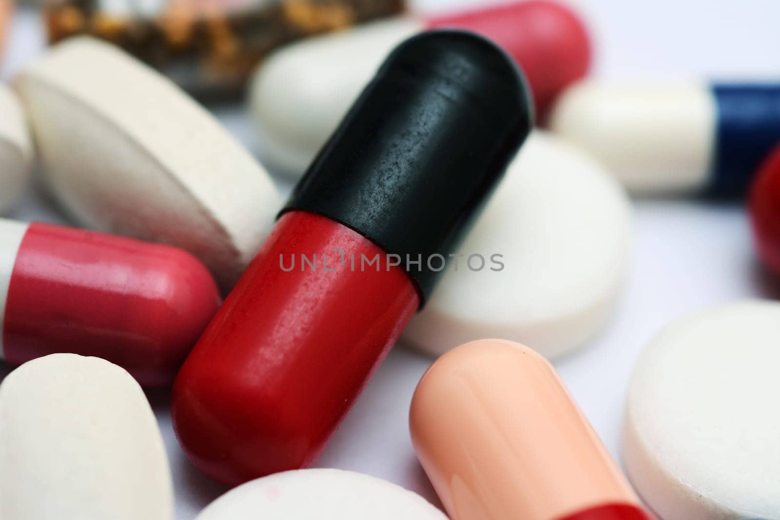 Pills close up over white