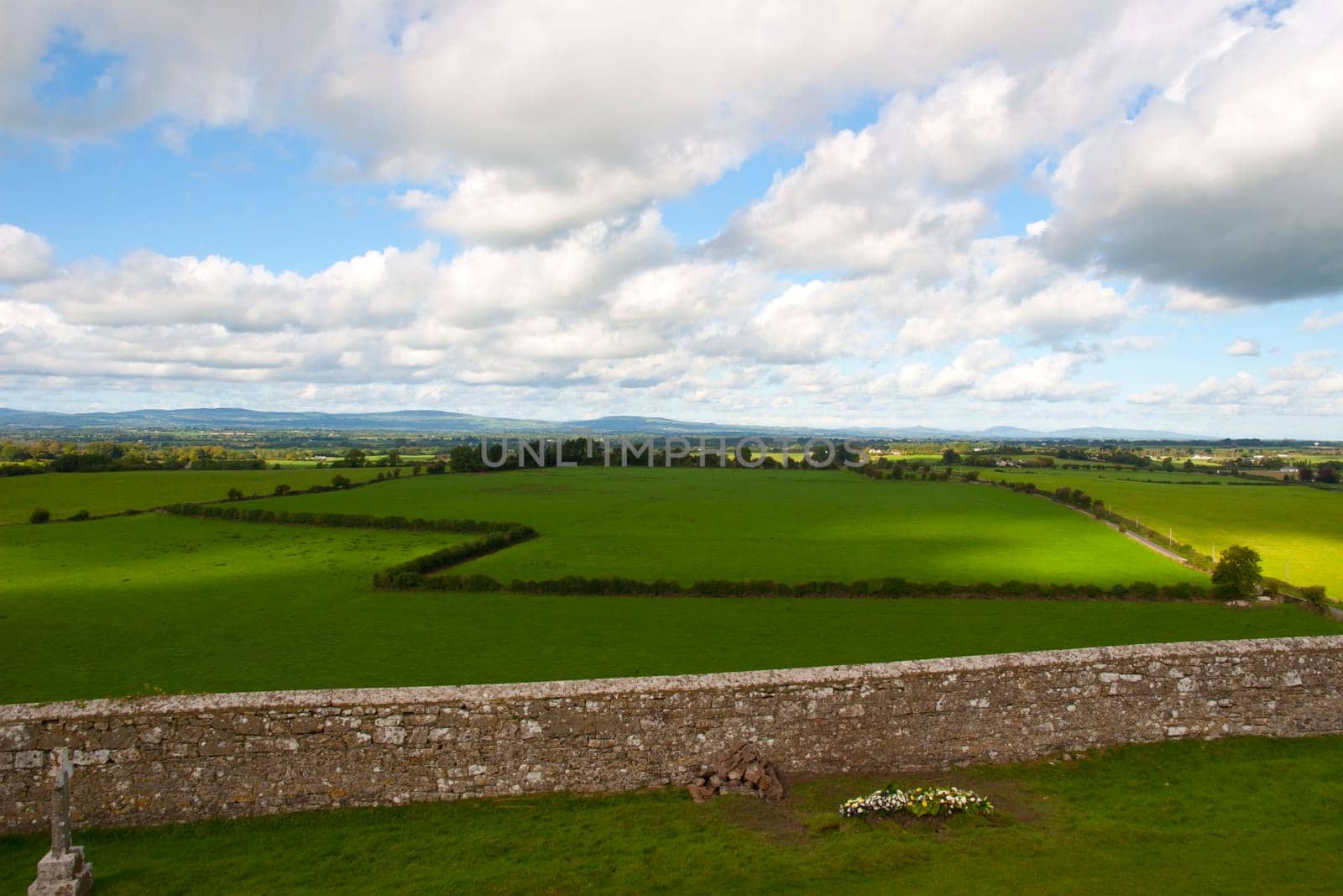 view from the rock of Cashel of the beautiful green fields and countryside