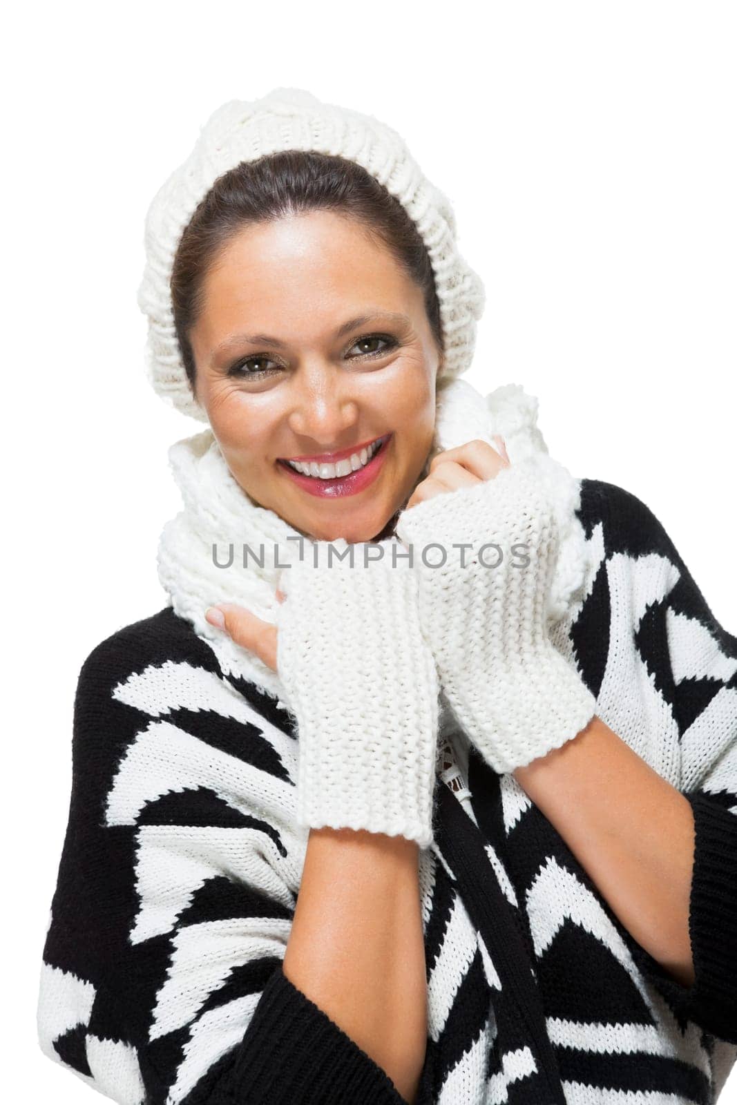 attractive young woman with white wool hat and knitted sweater scarf gloves with dark hair laughing isolated on white background