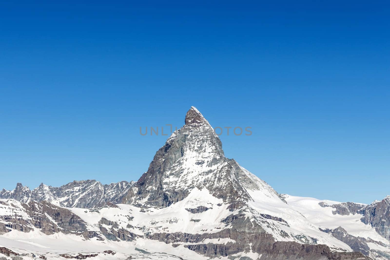 mountain Matterhorn with blue sky, Alps, Zermatt, Switzerland