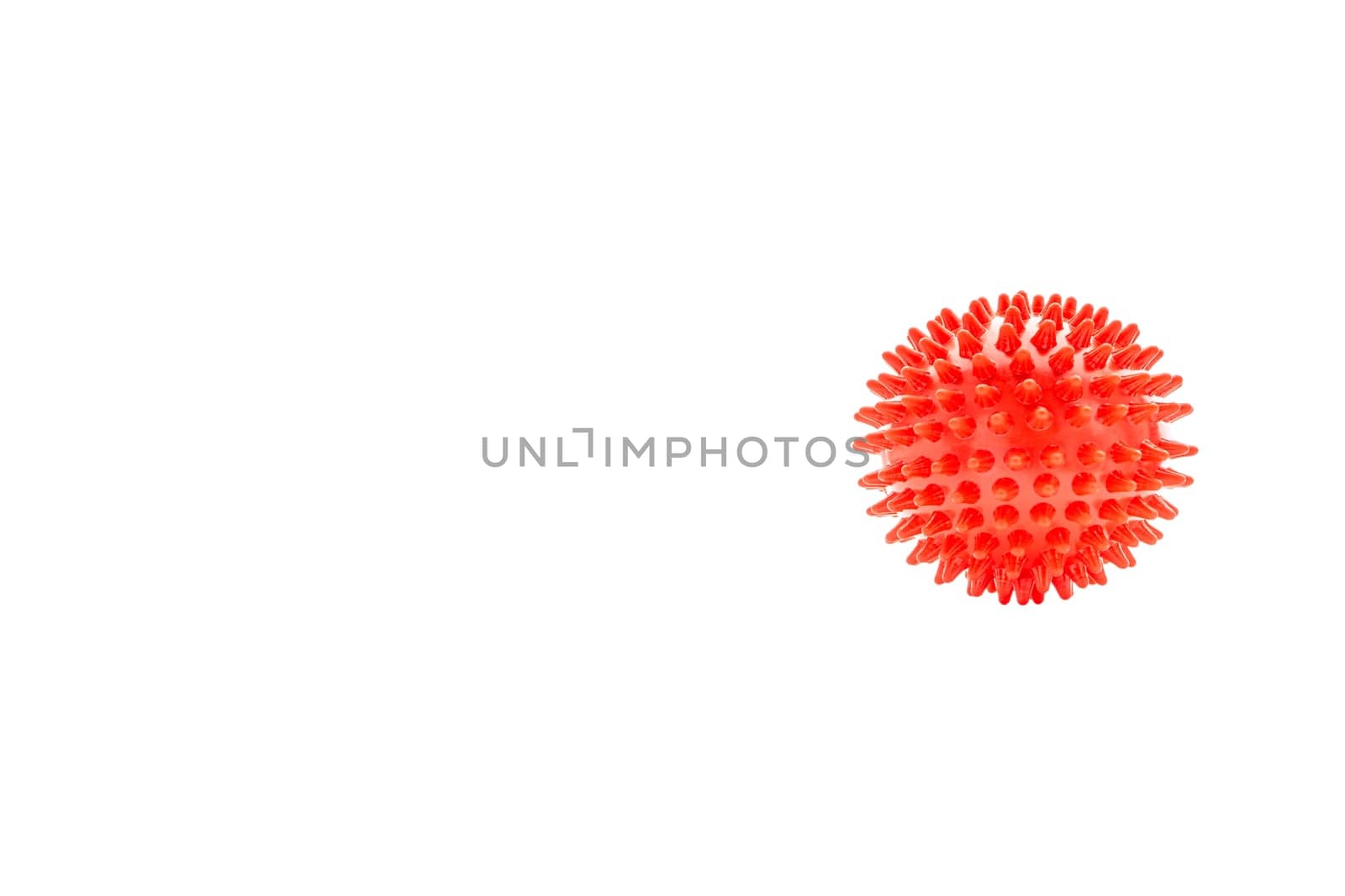 Massage ball or rubber spike ball isolated on white background. Healthcare, self massage and reflexology therapy concept