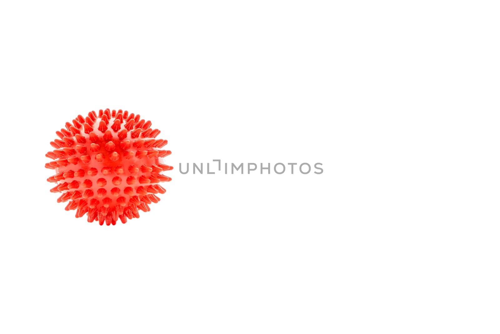 Massage ball or rubber spike ball isolated on white background. Healthcare, self massage and reflexology therapy concept