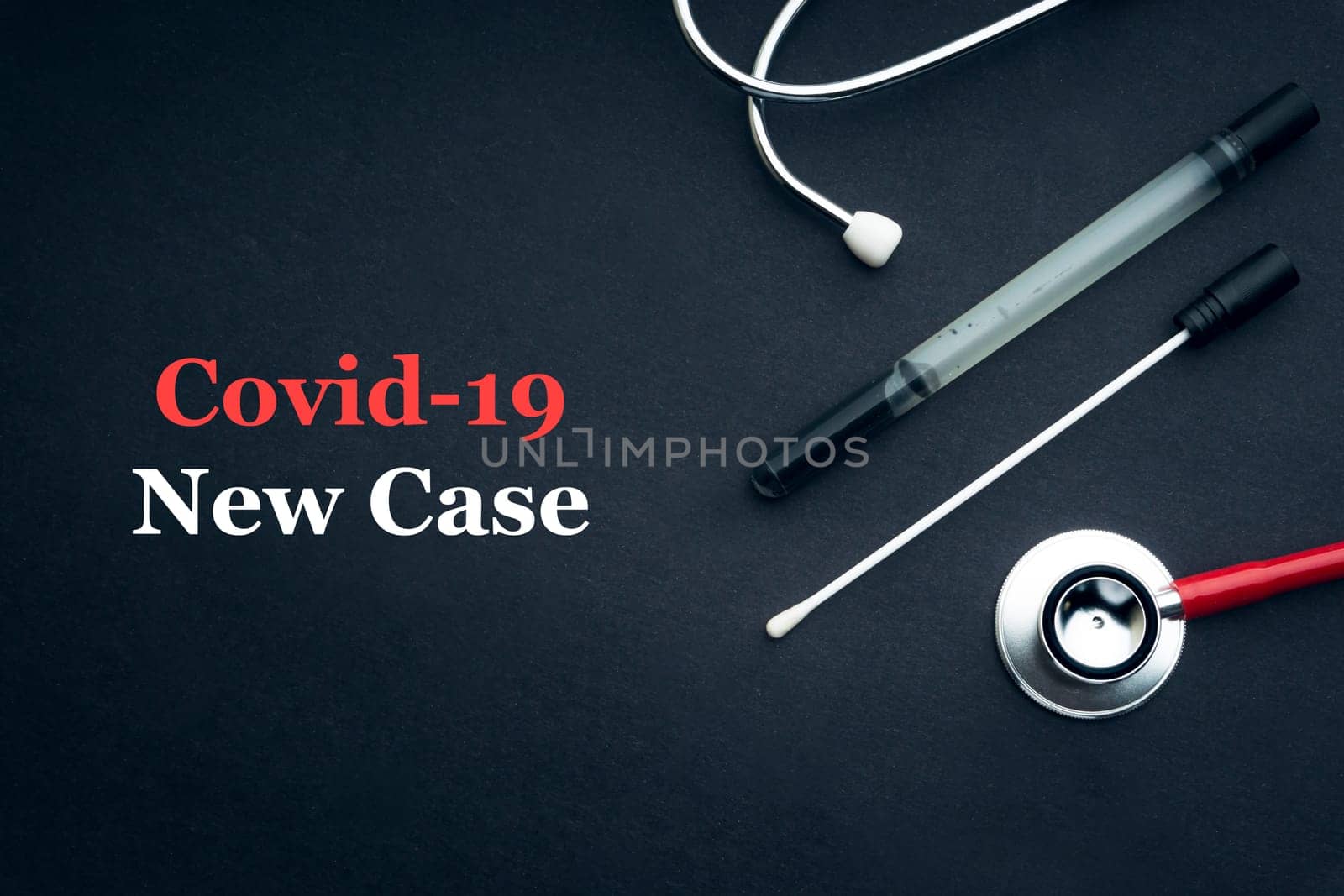 COVID-19 or CORONAVIRUS NEW CASE text with stethoscope and medical swab on black background. Covid-19 or Coronavirus concept.