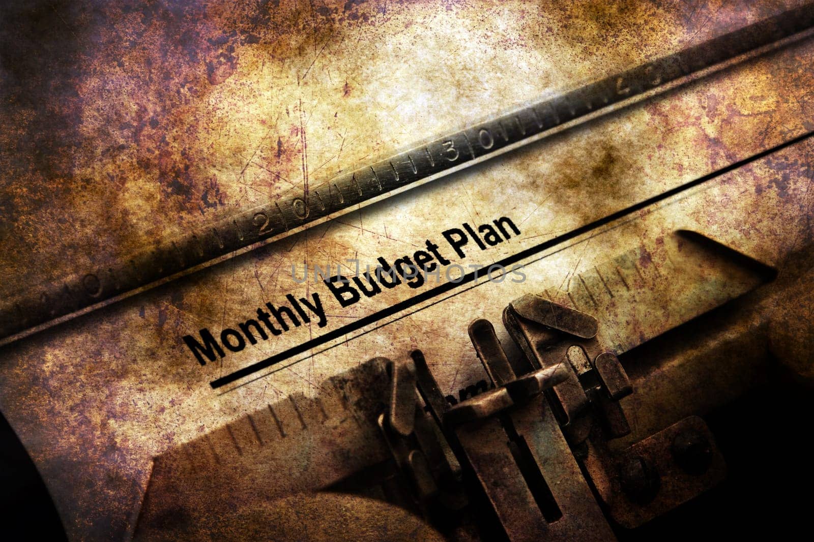 Monthly budget plan on vintage typewriter