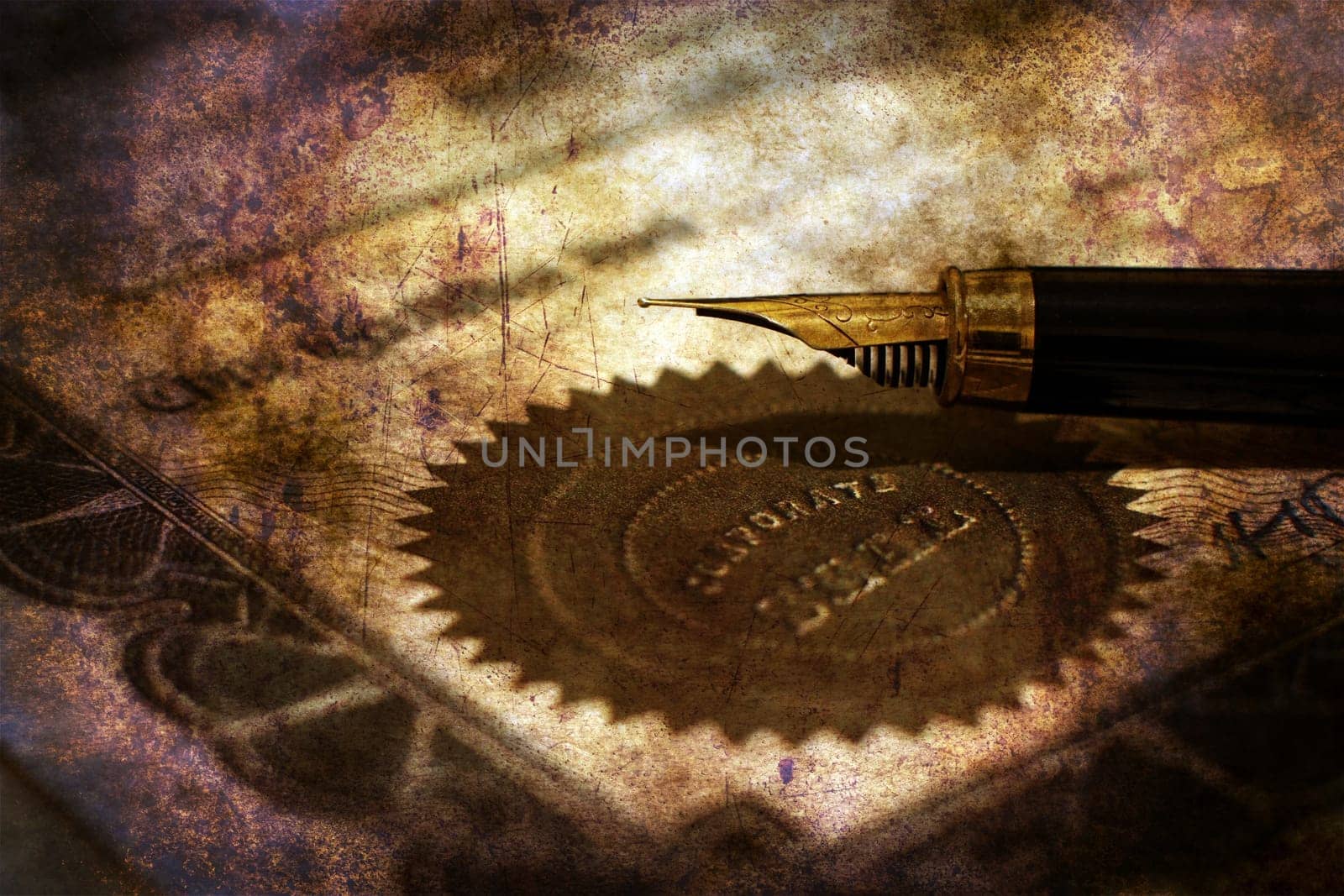 Fountain pen on corporate seal grunge concept