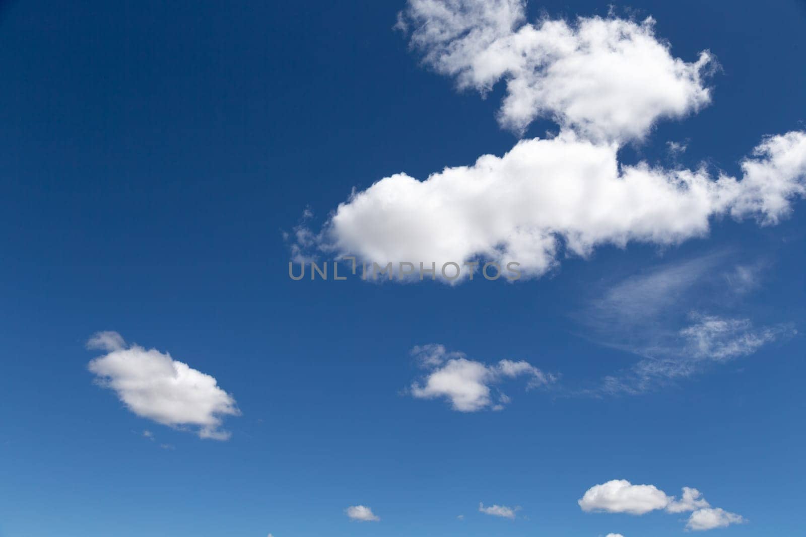 The blue sky with a white cloud