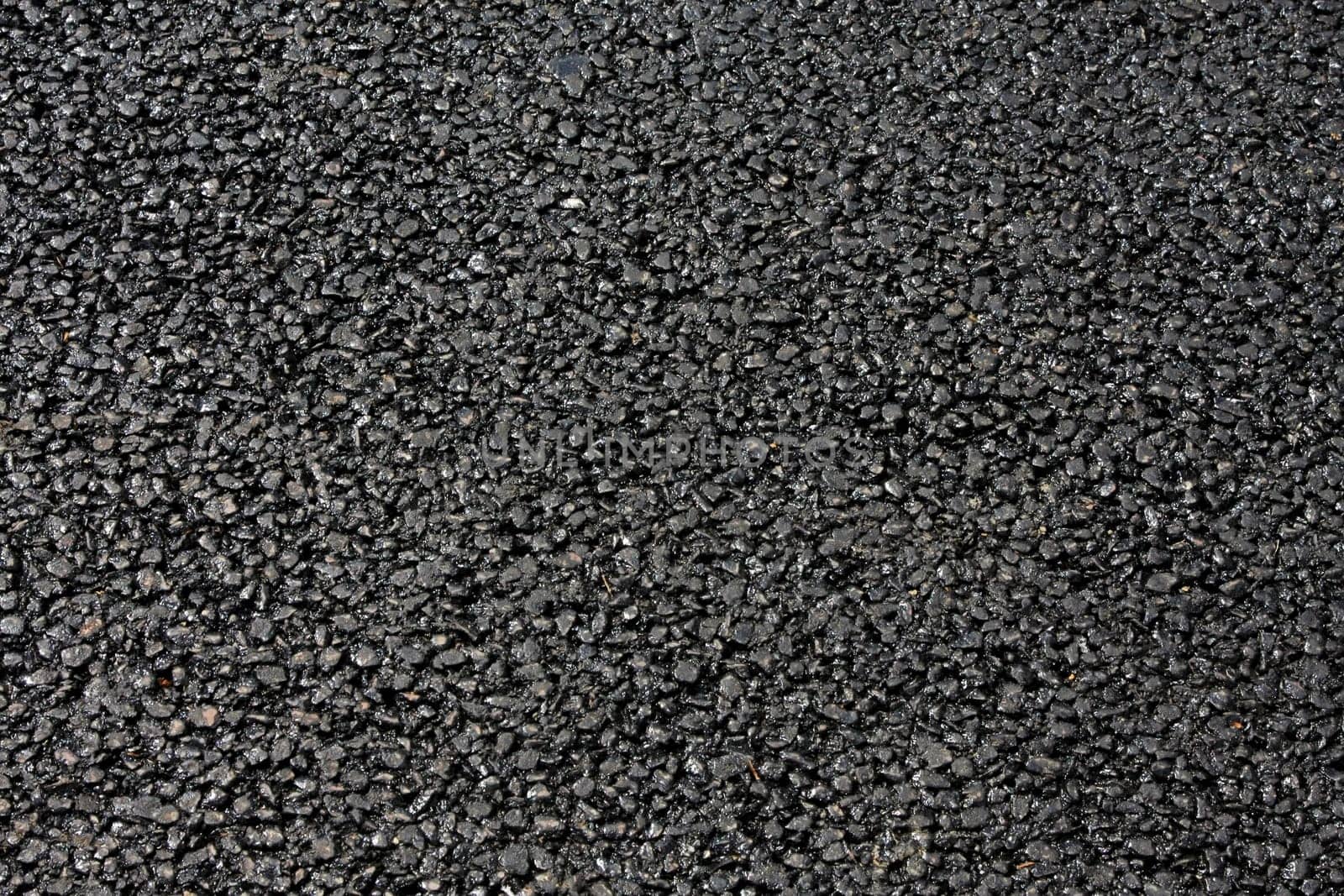 Background texture of road construction material asphalt.