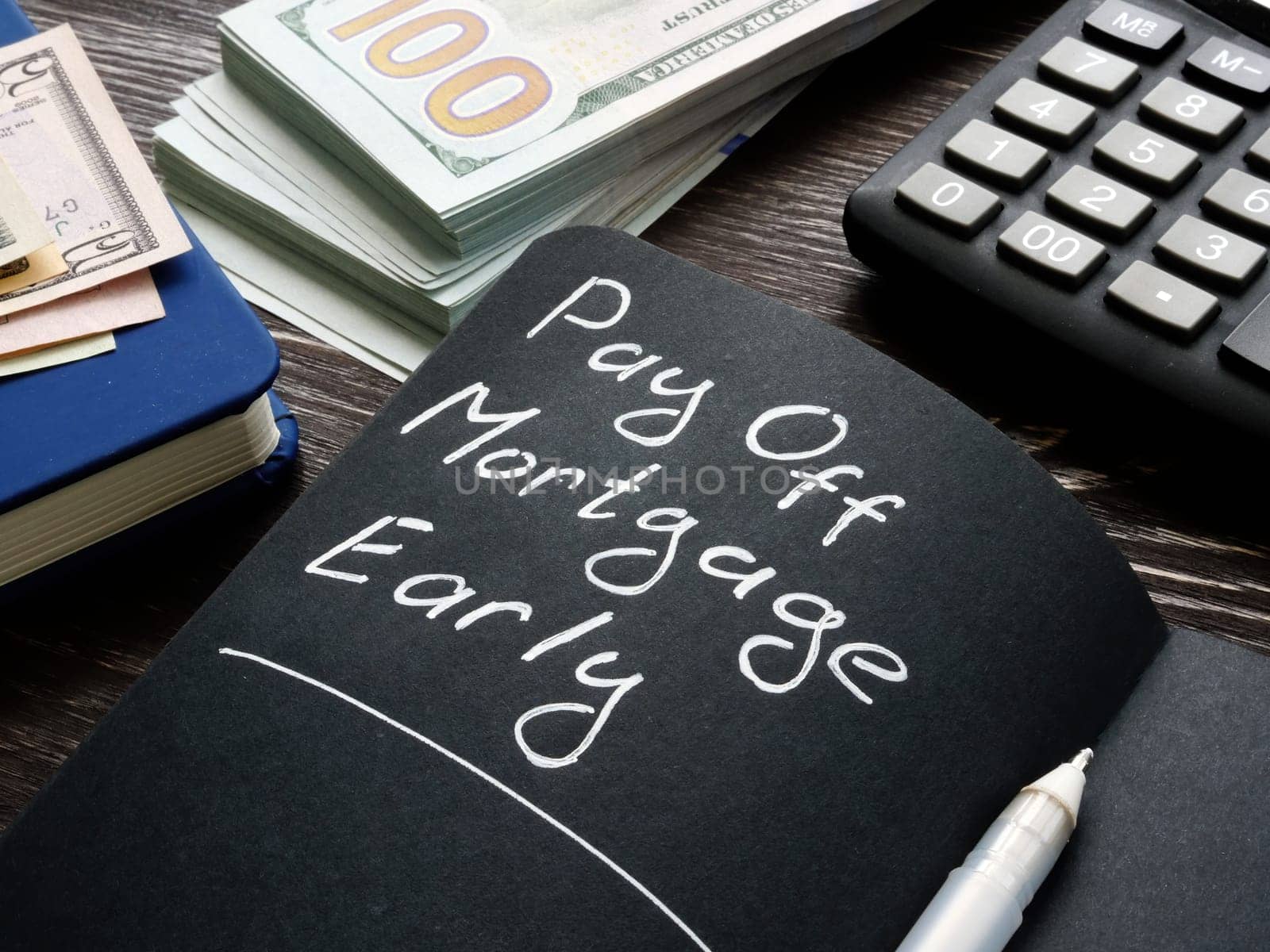 Pay off mortgage early memo on the black page.