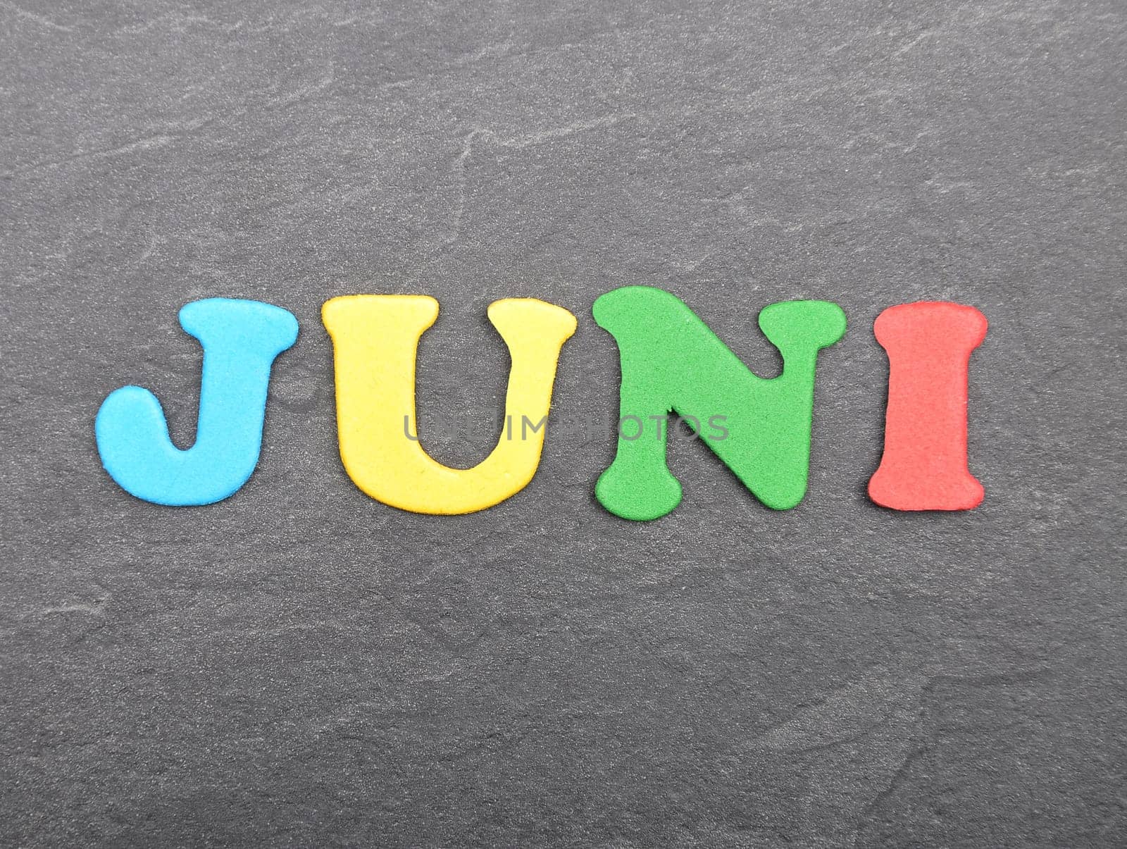 Term from colorful letters on slate board