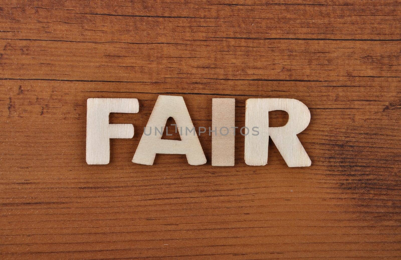 Term from wooden letters on old wooden board