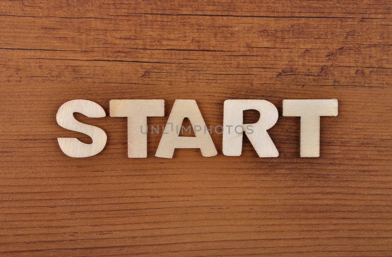 Term from wooden letters on old wooden board