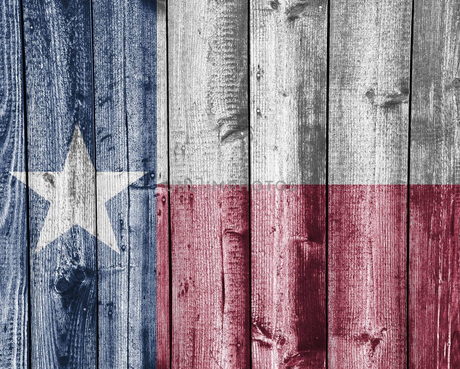 Flag of Texas on old wooden wall