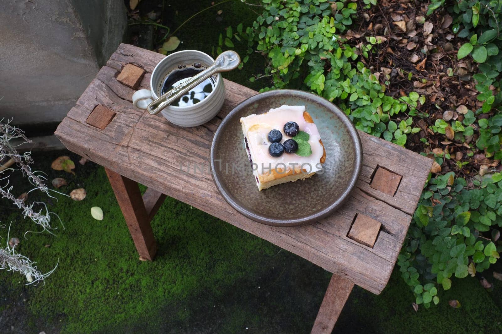 Coffee with piece of cake on wooden table , Concept Relax time, Copy space. Place for text.