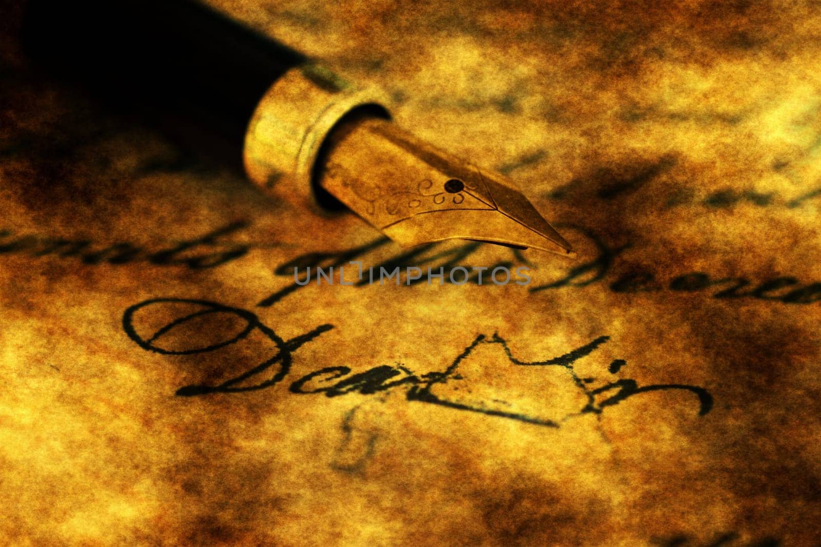 Fountain pen on old letter