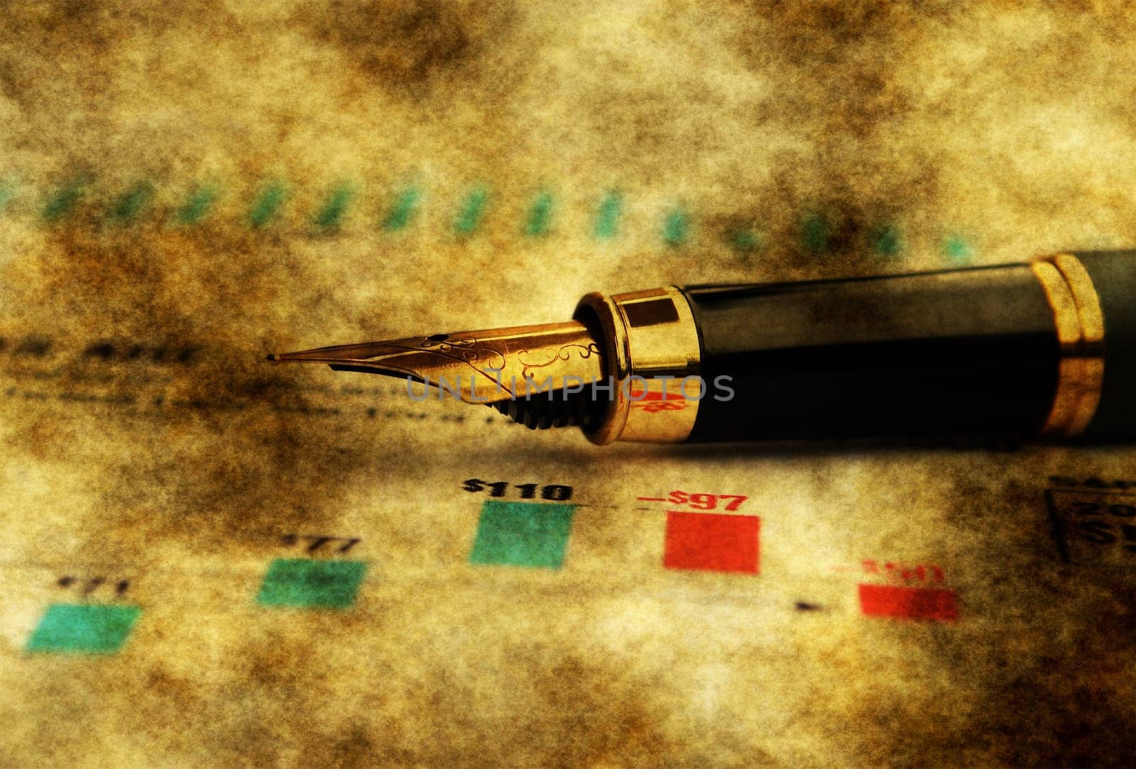Fountain pen on financial report