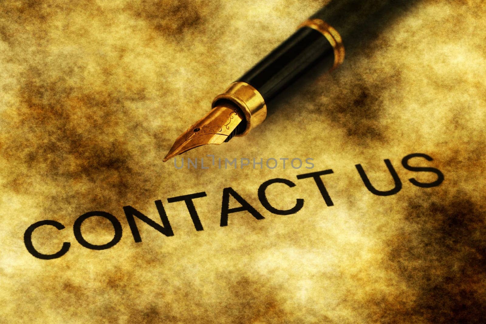 Fountain pen on contact us text