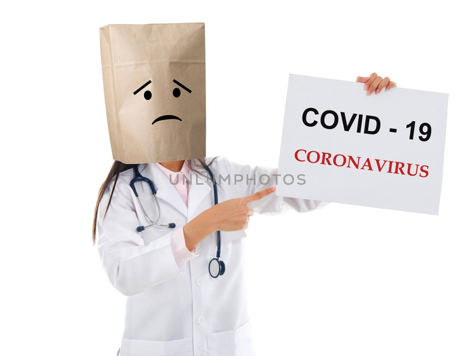 Medical staff holding a card with covid 19 on it.