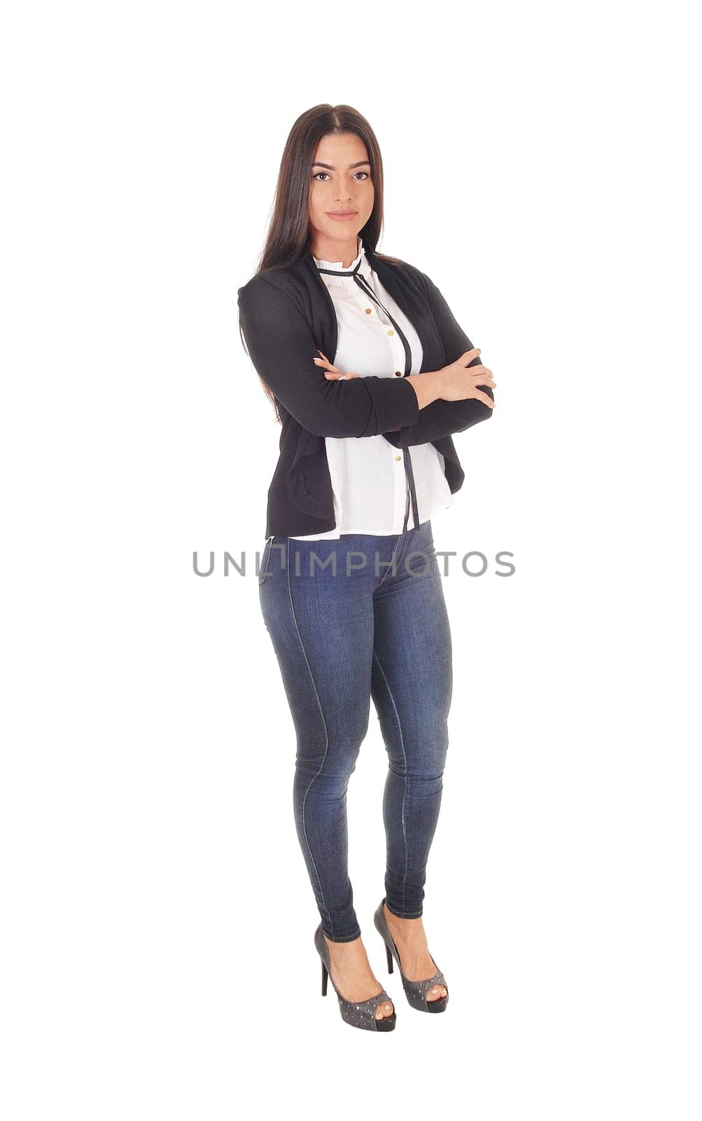 A gorgeous young woman standing in jeans and a black jacket.business outfit from the front, isolated for white background.
