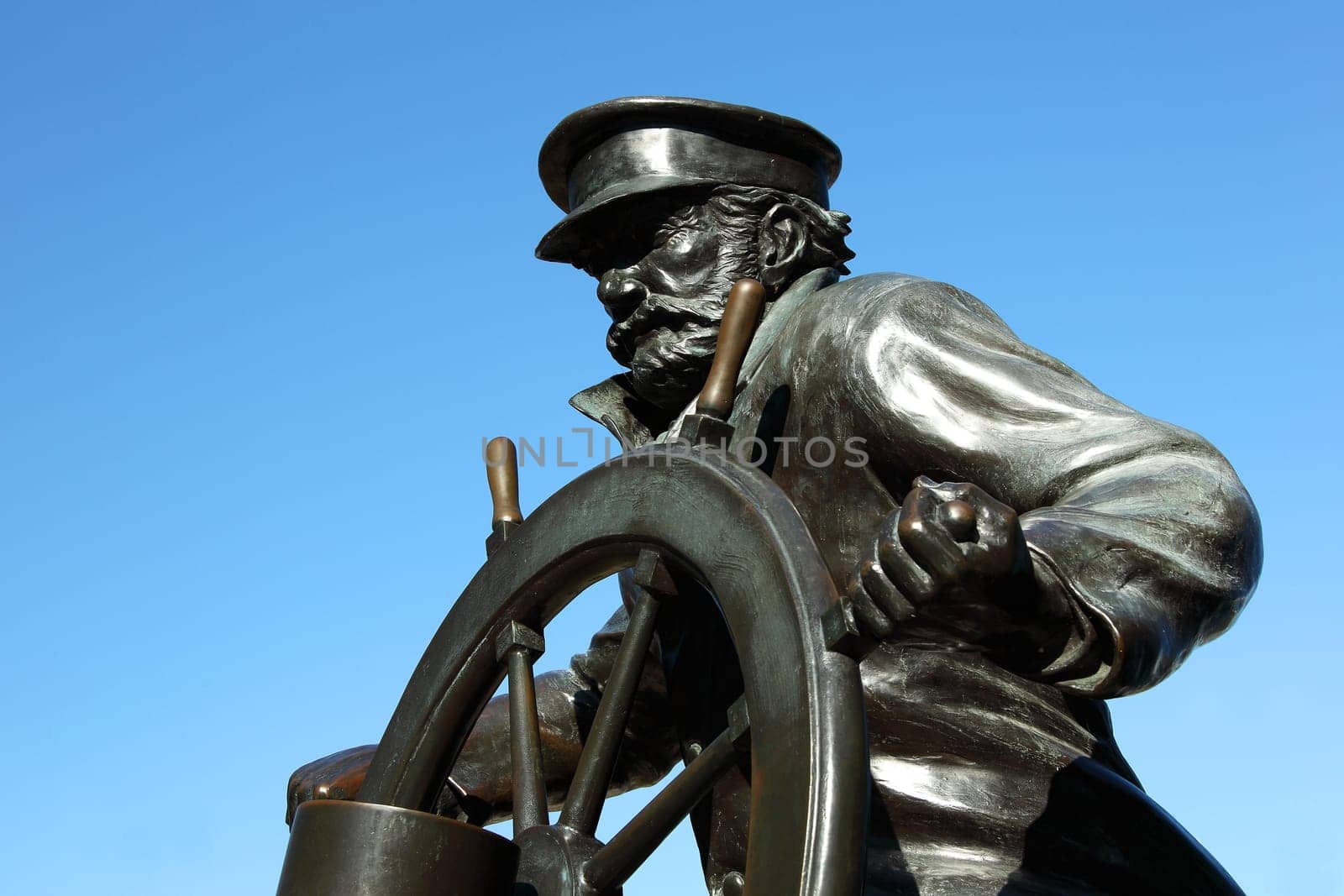CHICAGO, ILLINOIS/USA-OCTOBER 14 2015: Captain on the Helm sailors memorial statue at Navy Pier Chicago on October 14 2015, Chicago, Illinois