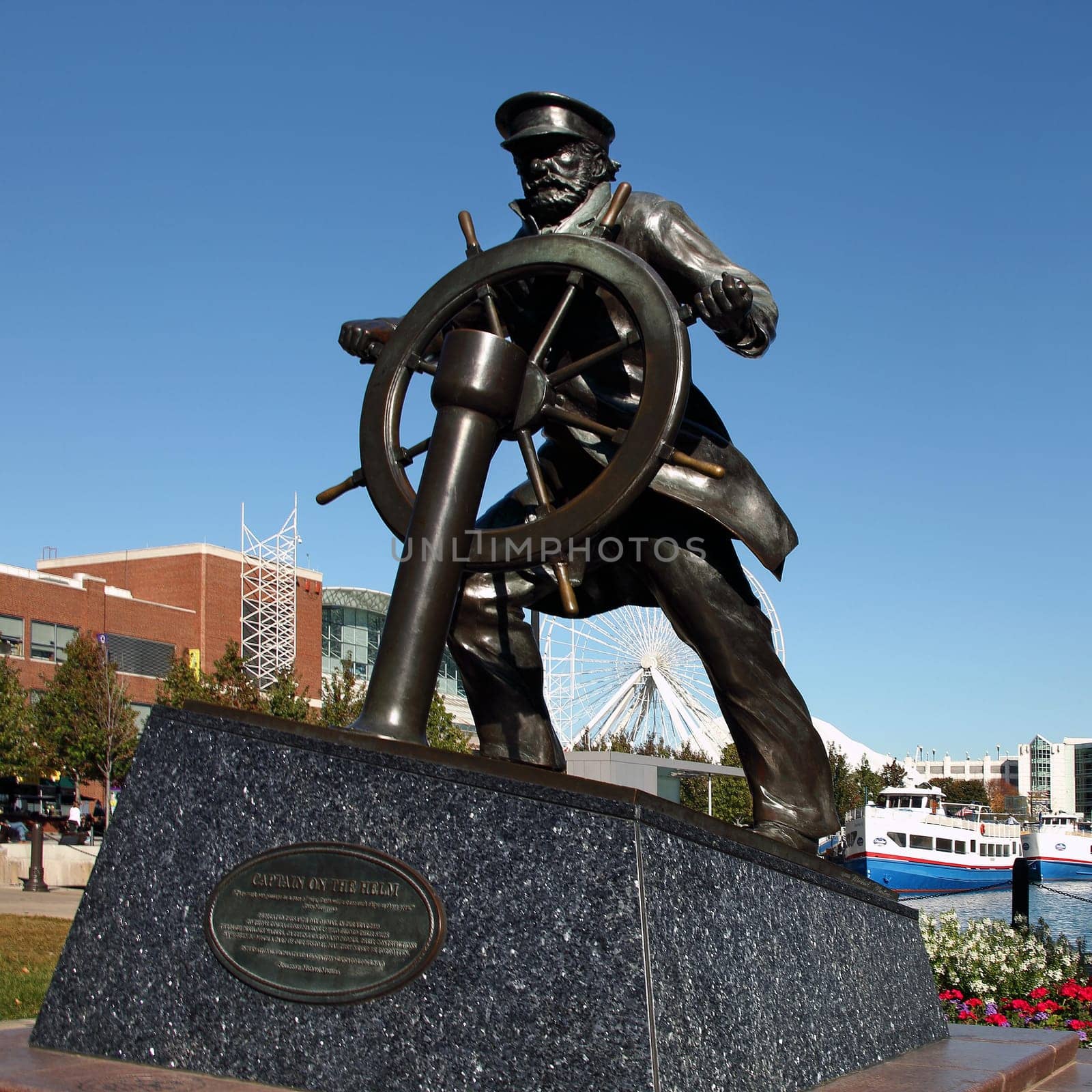 CHICAGO, ILLINOIS/USA-OCTOBER 14 2015: Captain on the Helm sailors memorial statue at Navy Pier Chicago on October 14 2015, Chicago, Illinois