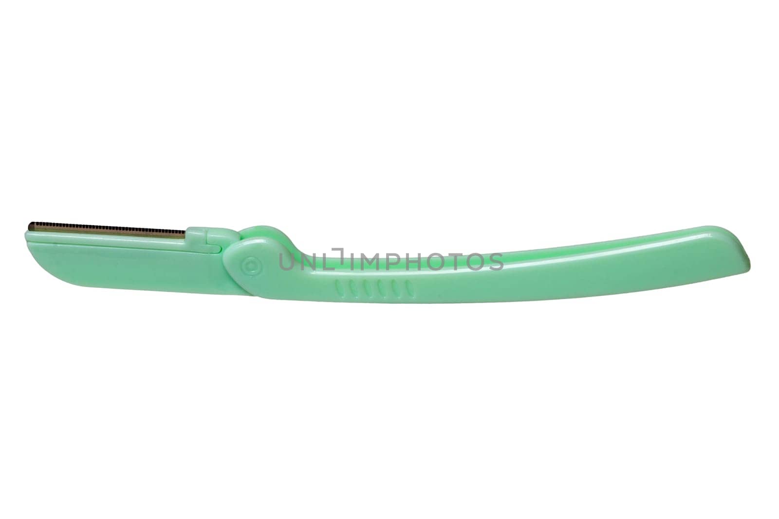 Cosmetic tools. Close-up of a green eyebrow razor isolated on a white background. Beauty concept. Macro.