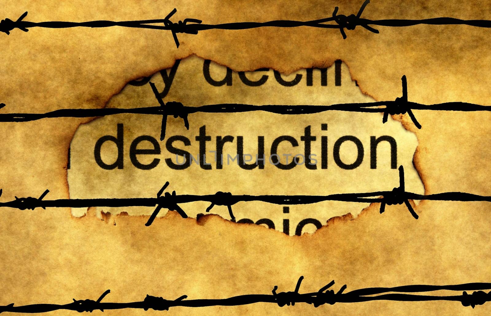 Deconstruction text on paper hole against barbwire
