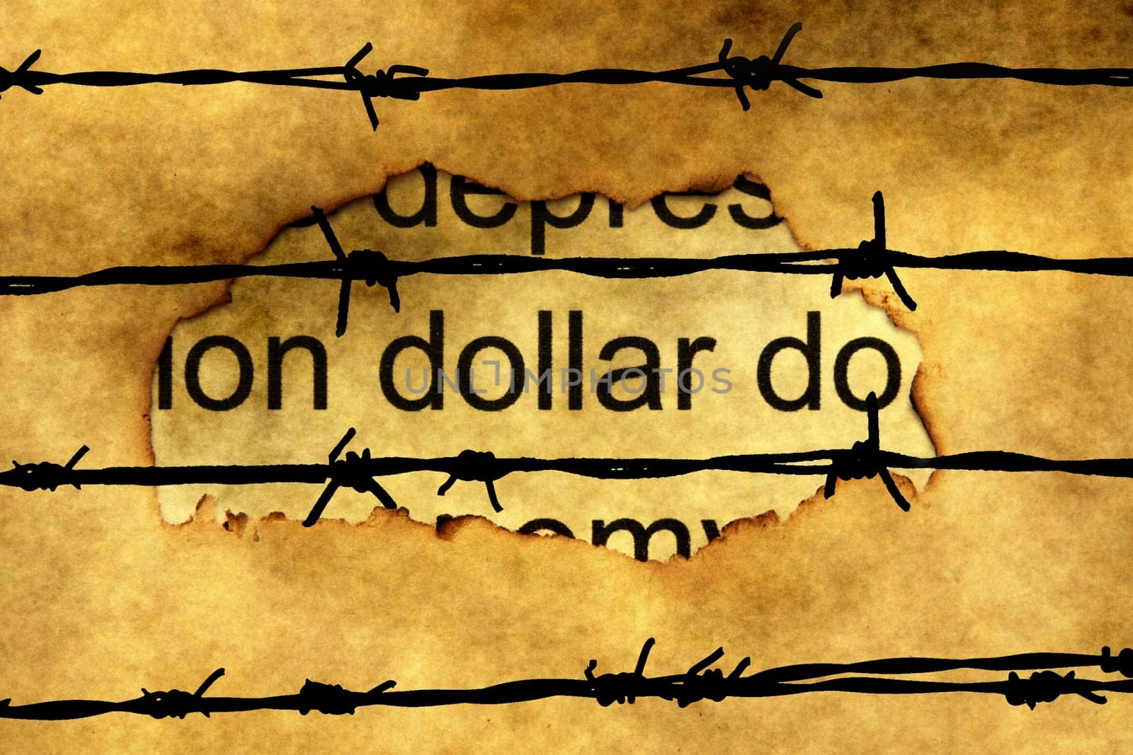 Dollar text on paper hole against barbwire