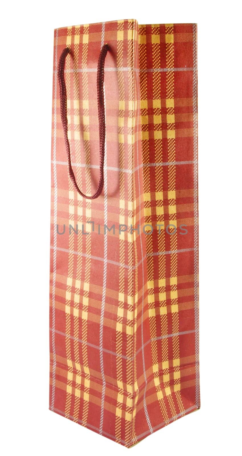 Closeup of brown present bag over white