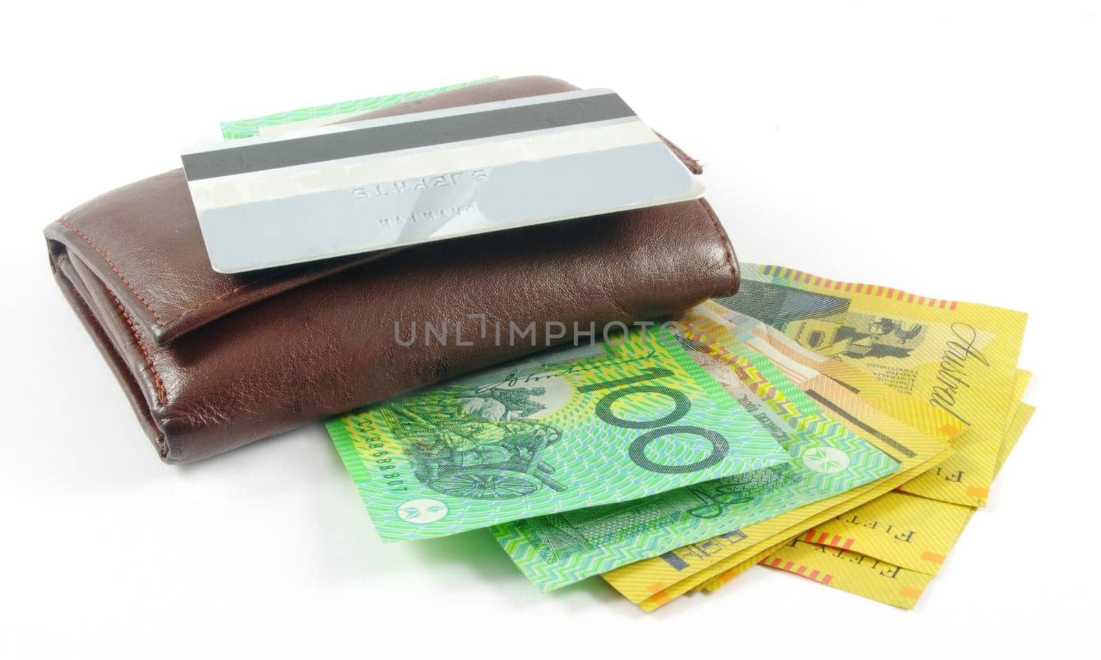 wallet with australian money and credit card over white