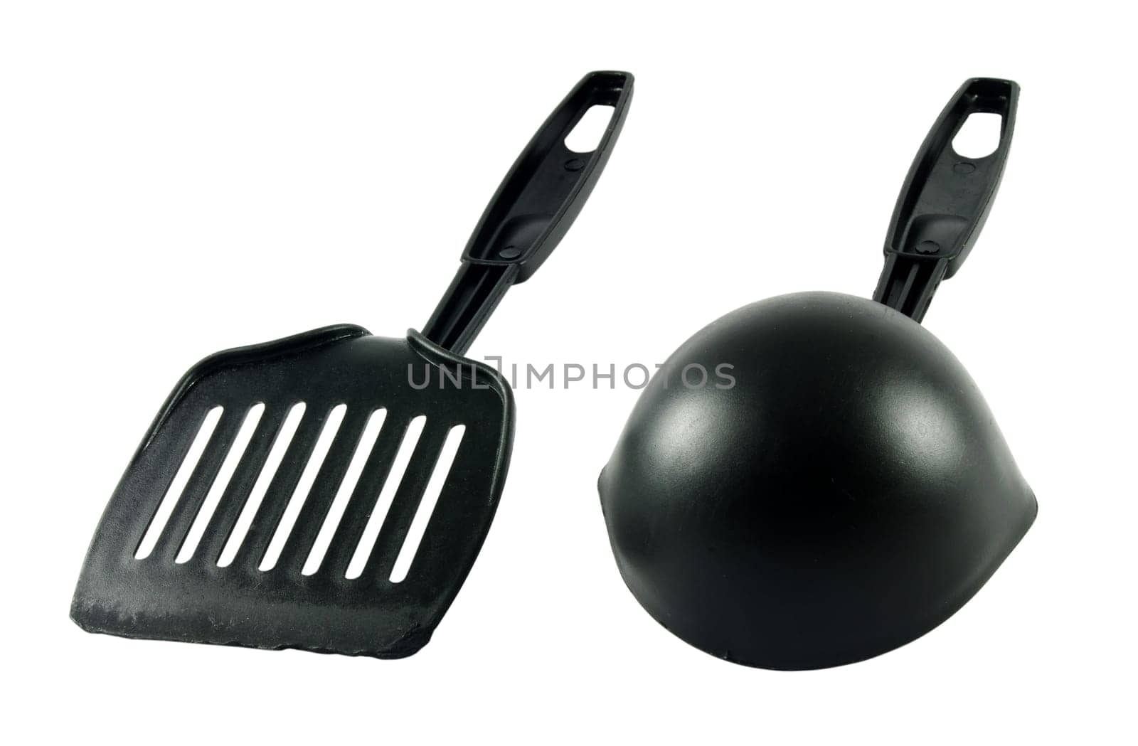 Two kitchen tools over the white surface