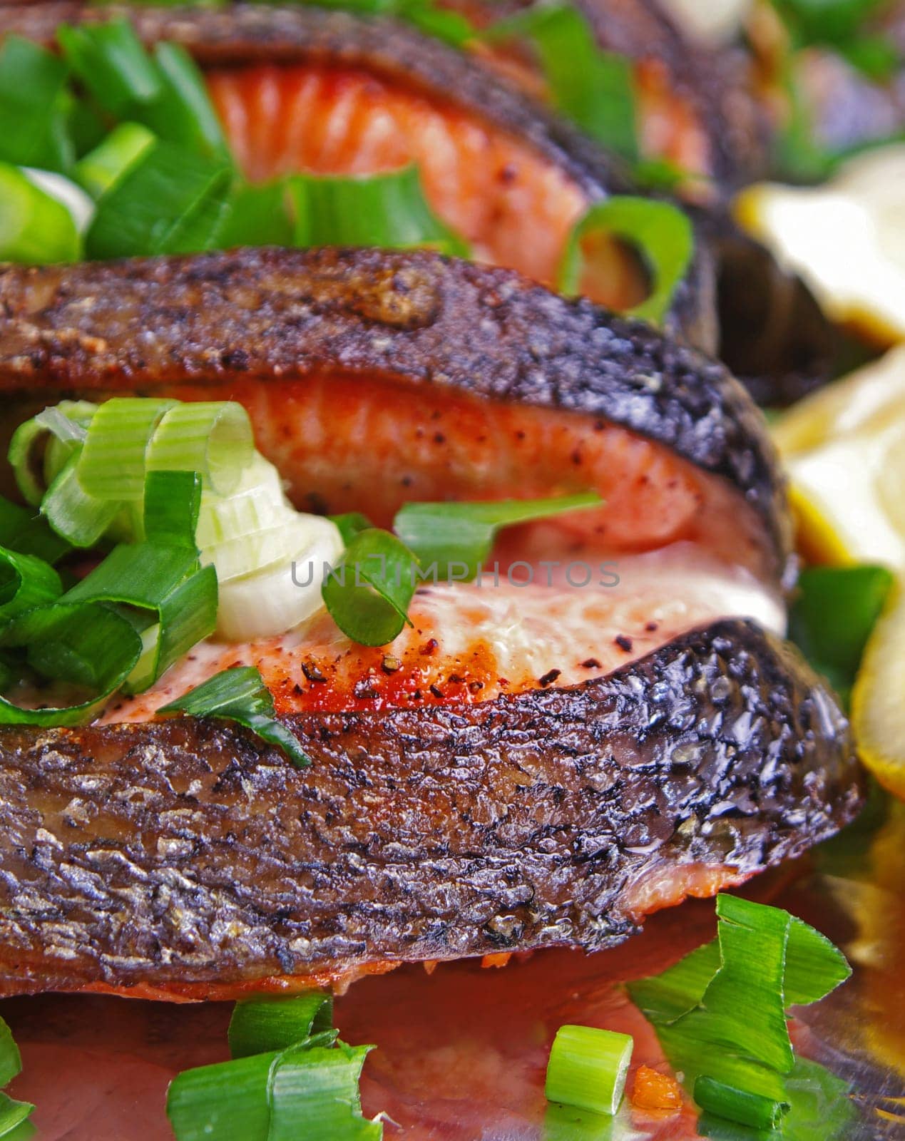 prepared salmon dish with onion