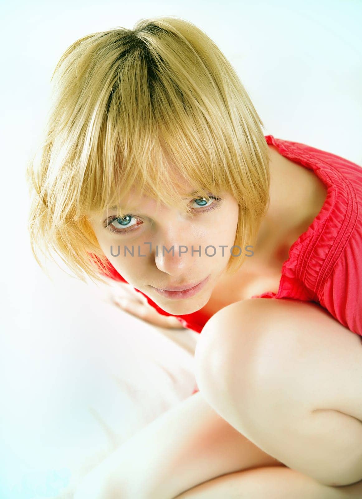 beautiful girl  sitting on bed