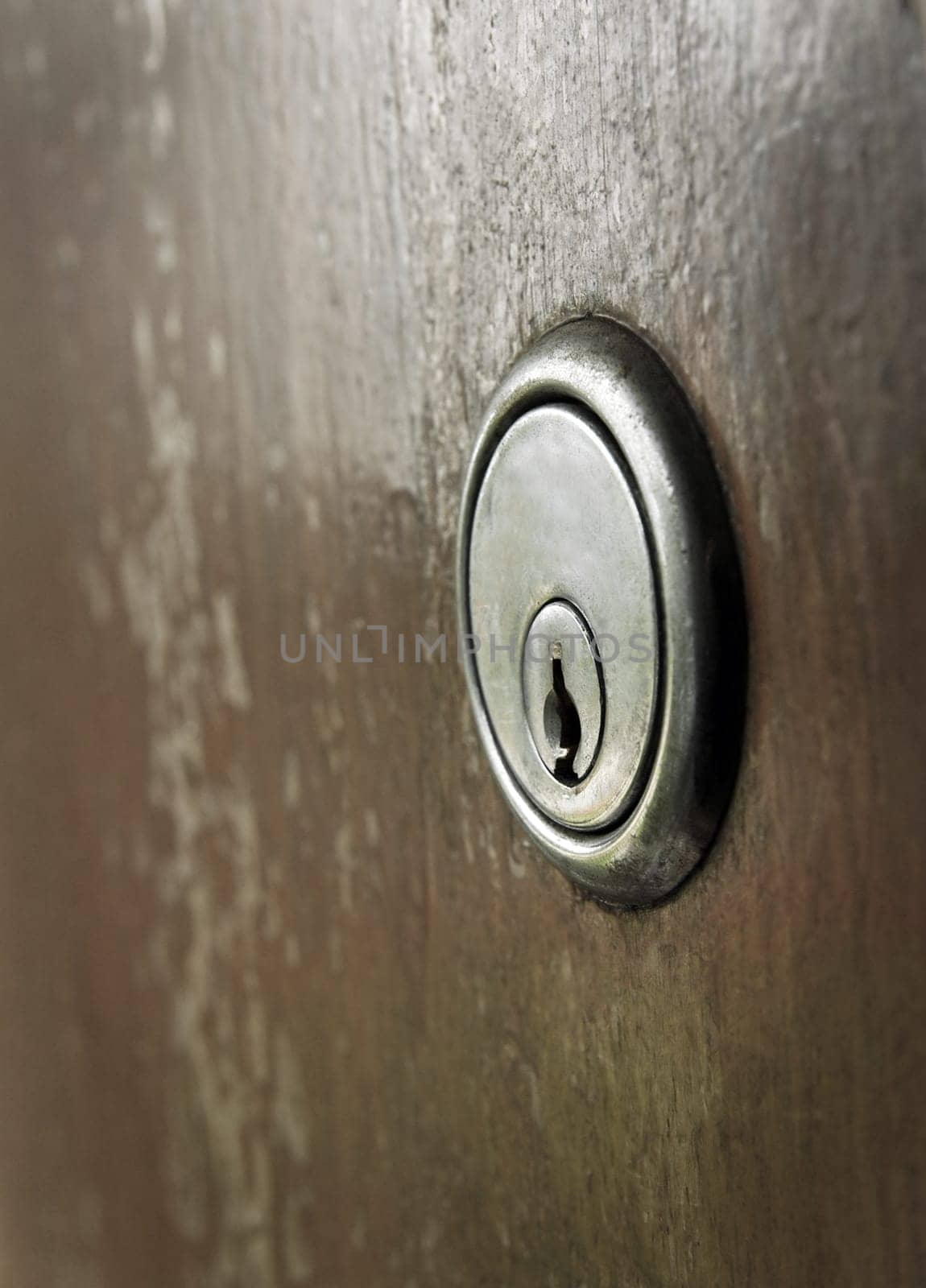 closeup of old rusty keyhole.shallow DOF