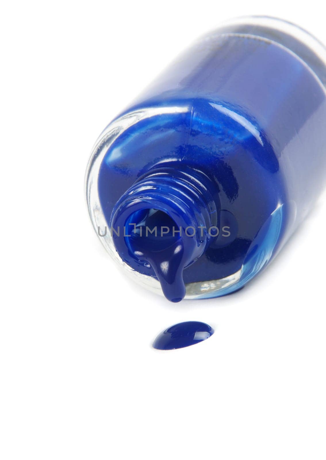 blue nail polish bottle on white